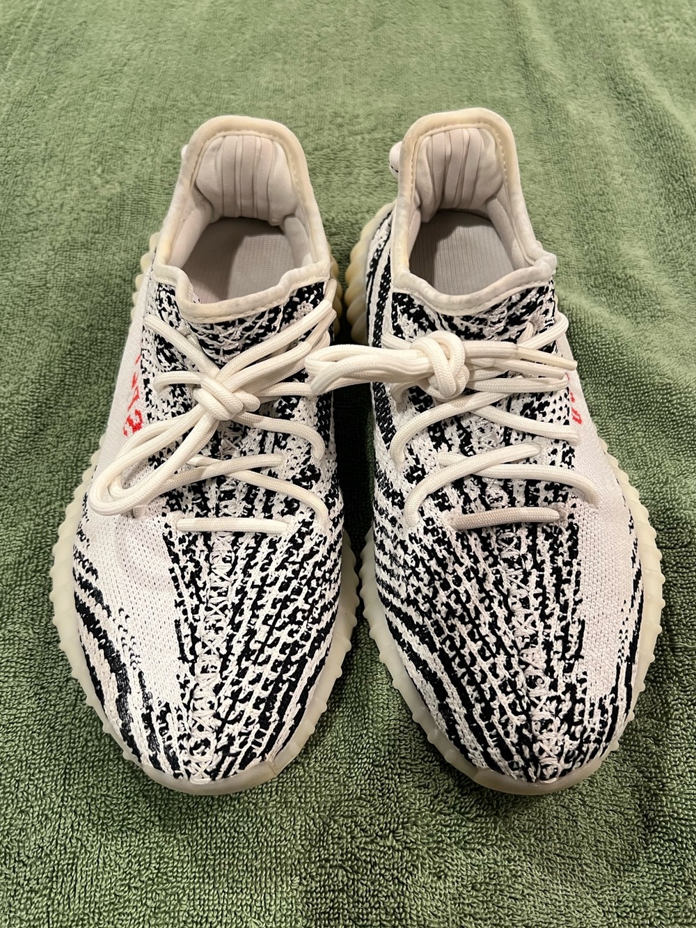 Yeezy 350 in color Zebra. Size 6.5M/ 8W.
